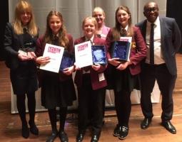Champions Esther, Anna, and Amelie with Headteacher Mr Botwe, Teacher Mrs Burke and Rotarian Mary Grant. 